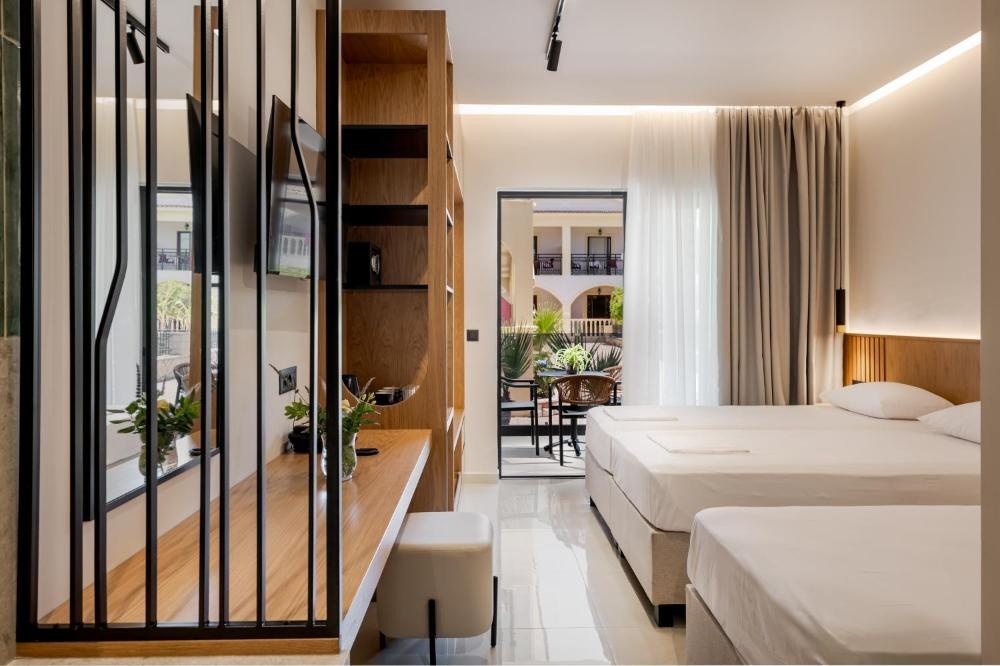 Triple Room with Garden View at Canadian Hotel, photo 4